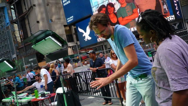 Artist Daniel Canogar during the filming of Storming Times Square, July 24, 2014. Photo © Kathleen MacQueen.