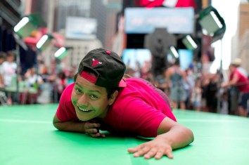 Midnight Moment: Daniel Canogar, Storming Times Square, 2014. Photograph by Clint Spaulding for @TSqArts